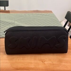 SKIMS pouch
